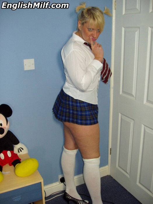 Older UK amateur Daniella English slides panties aside in schoolgirl attire - #6