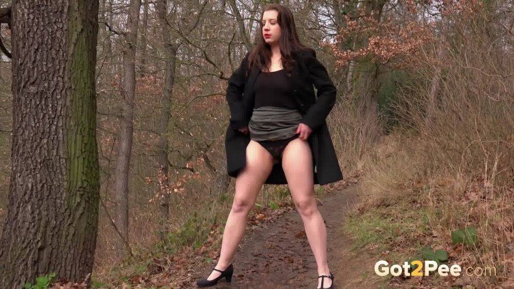 Chubby girl Tereza Red hikes her skirt and takes a pee in the forest - #8