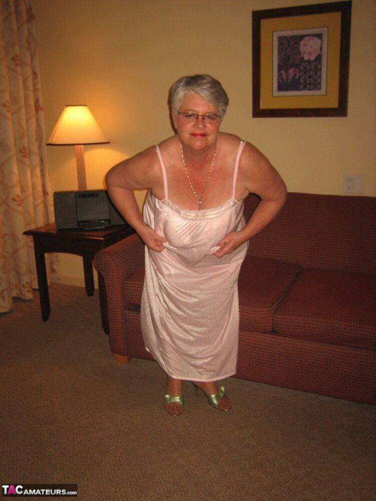 Amateur granny on the heavy side shows her pussy in lingerie and tan nylons - #4