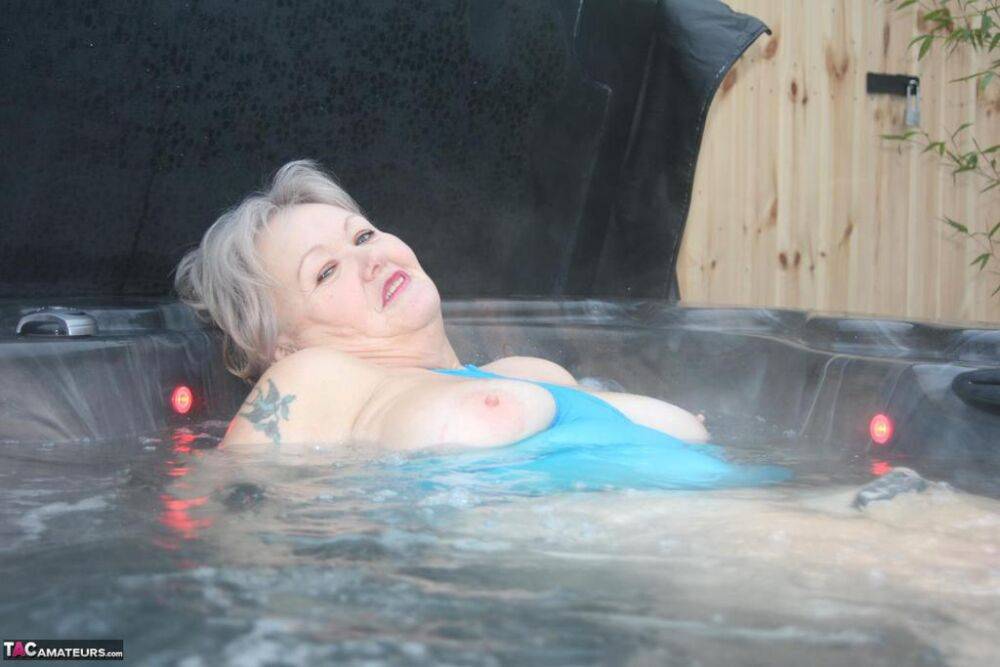 Chubby nan Valgasmic Exposed shows her tits and pussy in an outdoor hot tub - #8