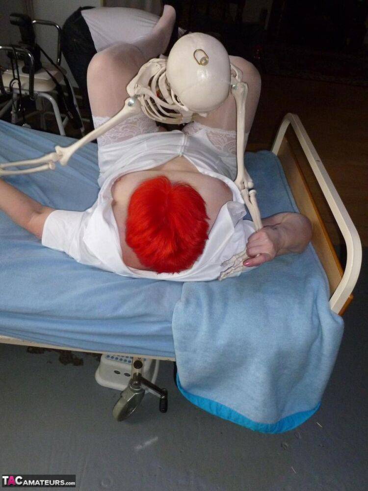 Older redhead nurse Valgasmic Exposed gets banged by a dildo wielding skeleton - #14