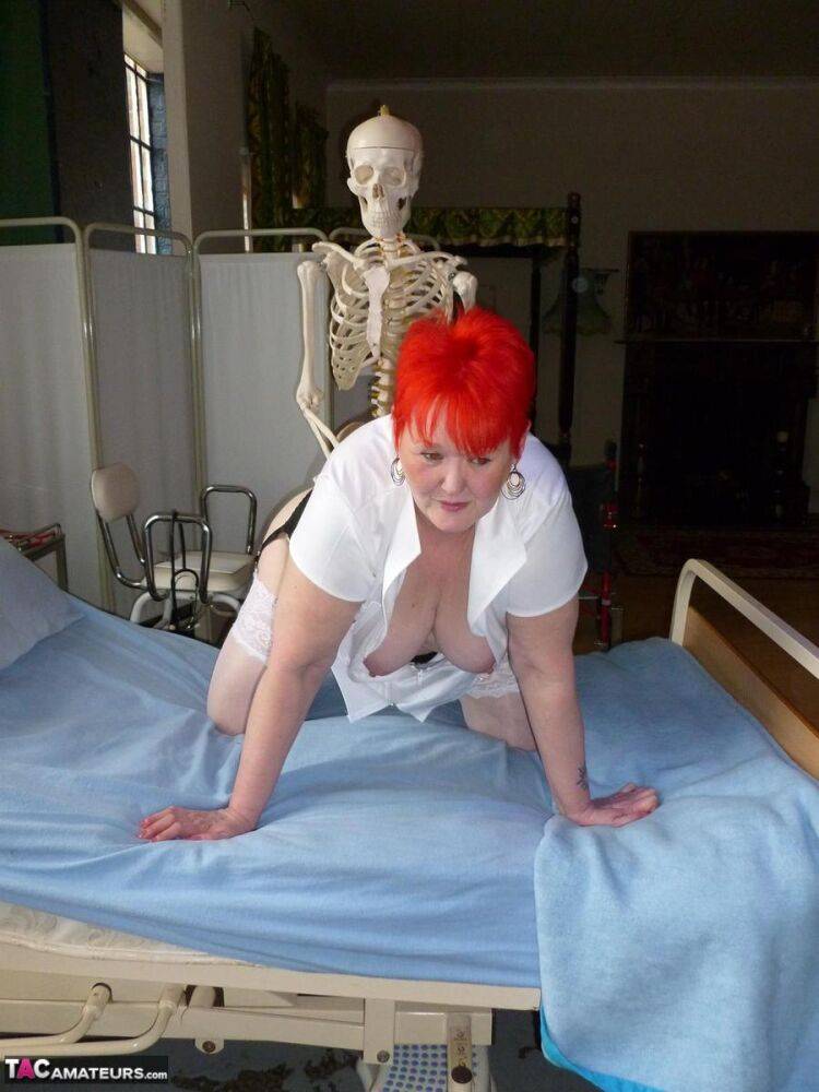 Older redhead nurse Valgasmic Exposed gets banged by a dildo wielding skeleton - #2