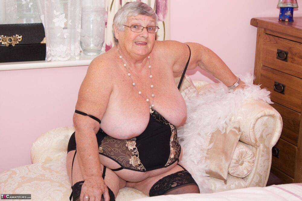 Short haired senior citizen works her tits and pussy free of lingerie - #11