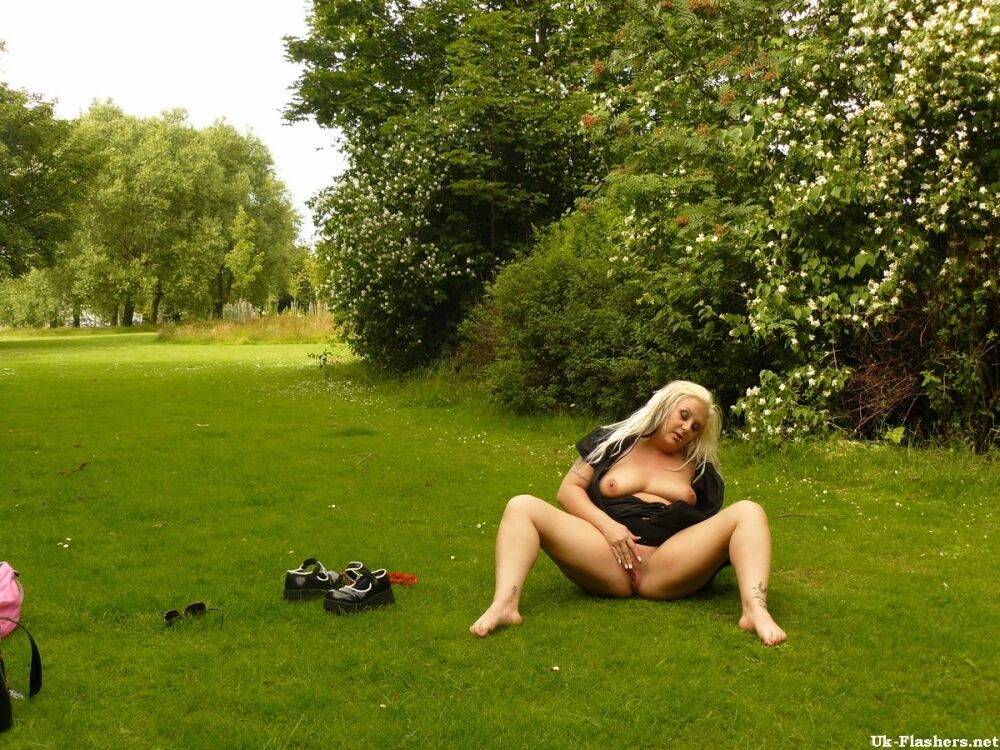 Chubby blonde masturbates on a lawn before being joined by her lesbian lover - #2