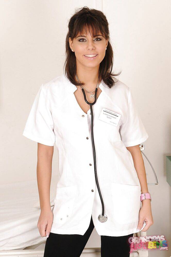 Stunning teen babe in nurse uniform Melanie Memphis stripping - #13