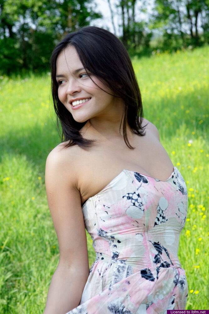 Nice Asian teen frees her breasts and pussy from her dress in a grassy meadow - #2