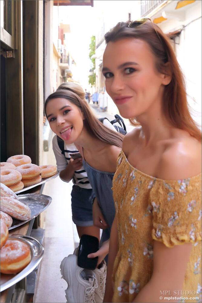 Leggy girls stumble across a donut stand while doing touristy things - #8