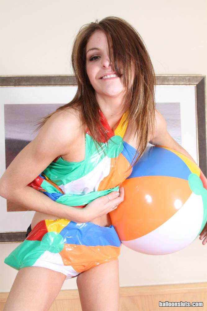 Slim teen girl lola trying to pop a beach ball - #10