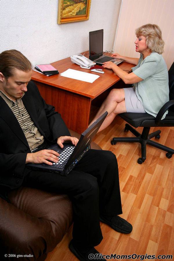 It guy stays in the office and gets seduced by a slutty mature blonde - #1