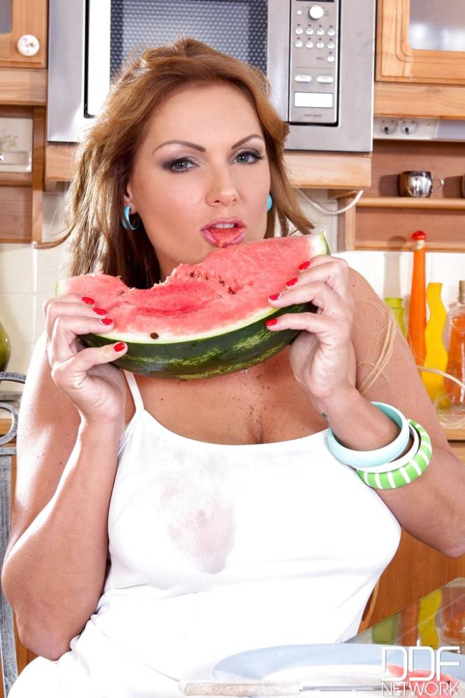 Glamorous hungarian milf Sheila Grant showing big knockers and jerking off in the kitchen - #1