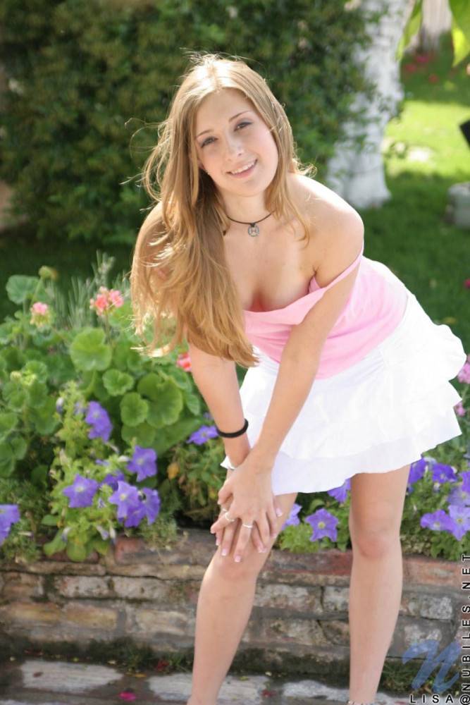 Smiling Cutie Lisa Nubiles In Pink Top And Snow White Skirt Poses In The Garden. - #13