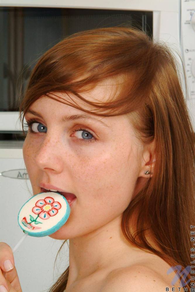 Red Haired Teen Babe Beth Nubiles Slowly Strips While Eating A Lollipop. - #18
