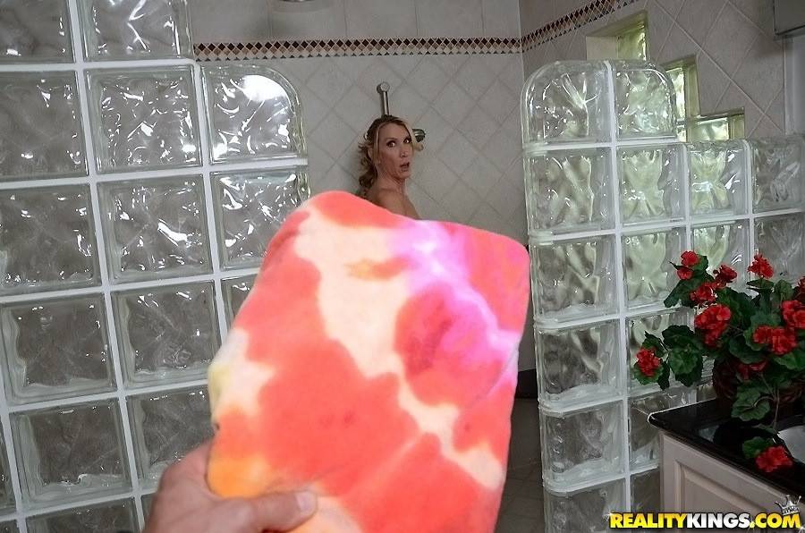 Very attractive american blonde milf Brynn Hunter exhibiting big hooters and hot ass in shower - #1