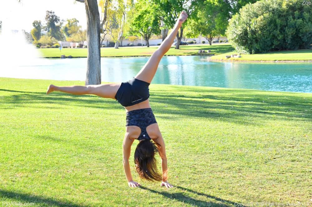 Teenage hottie in sexy outfit Zoe doing exercise outdoors by the water - #4