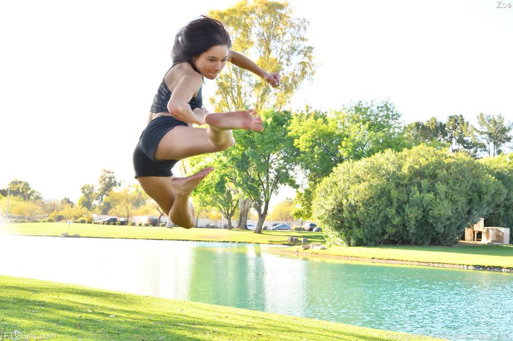 Teenage hottie in sexy outfit Zoe doing exercise outdoors by the water - #7