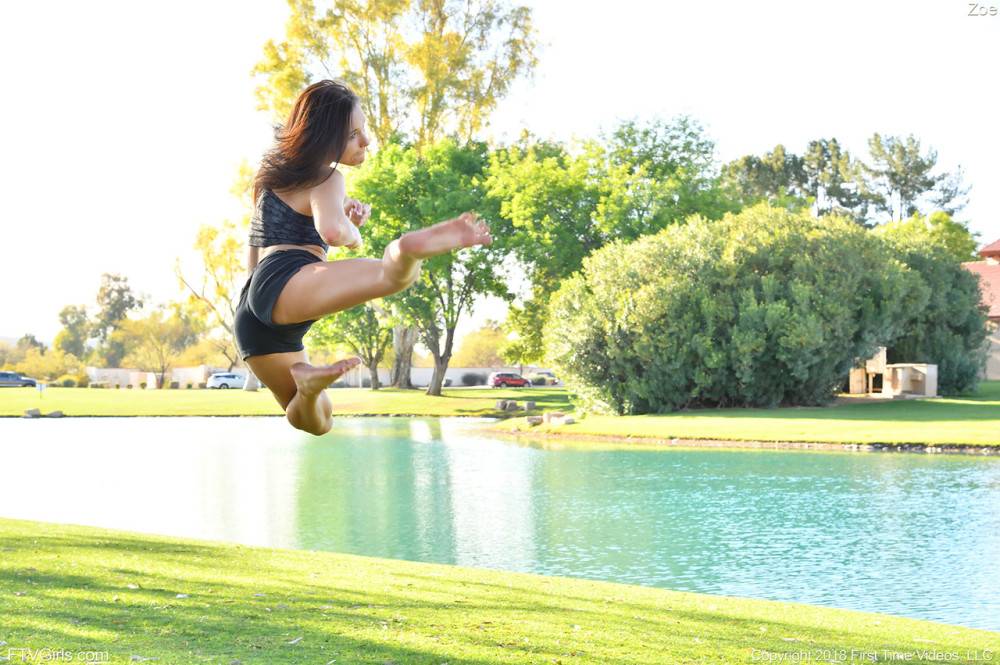 Teenage hottie in sexy outfit Zoe doing exercise outdoors by the water - #6