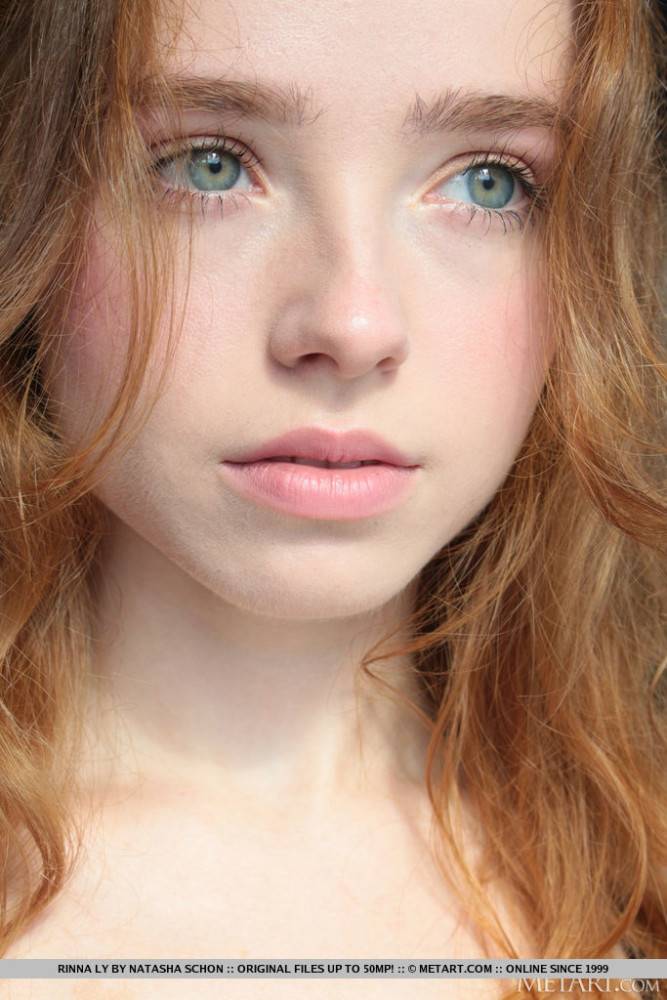 Young redhead Rinna Ly slips off black lingerie in a tempting fashion - #1