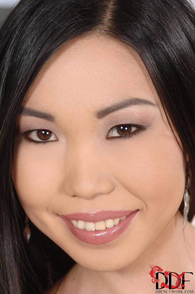 Horny Asian beauty Nicoline toying both her holes at once on the bed - #1