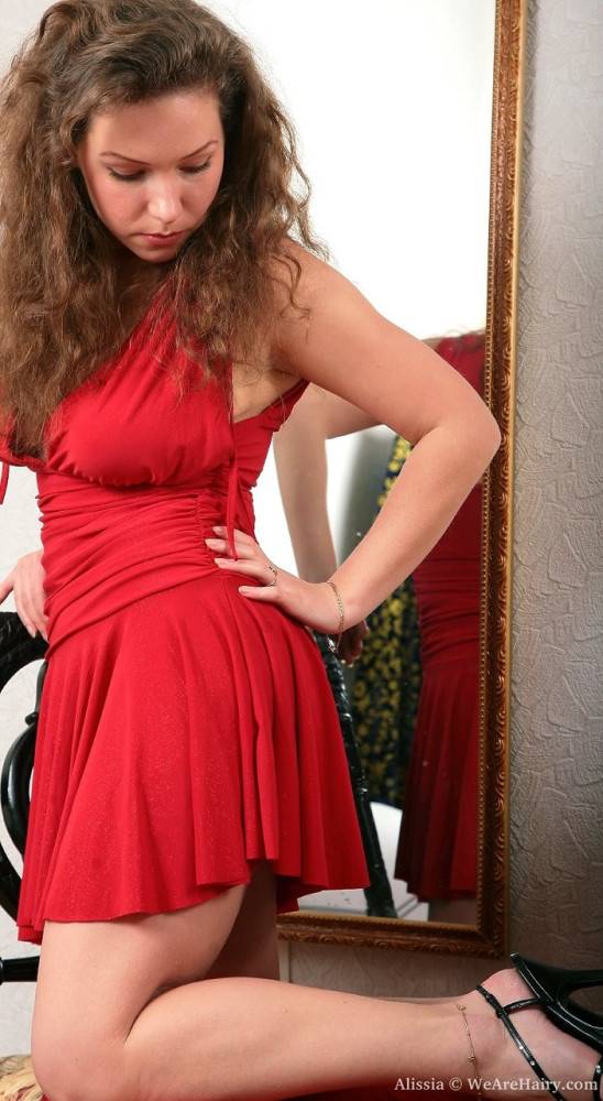 Curly haired Alissia doffs her red dress and reveals her bush and big tits - #2