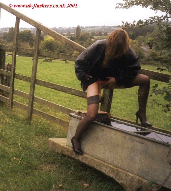 Mature lady pissing outside - #7