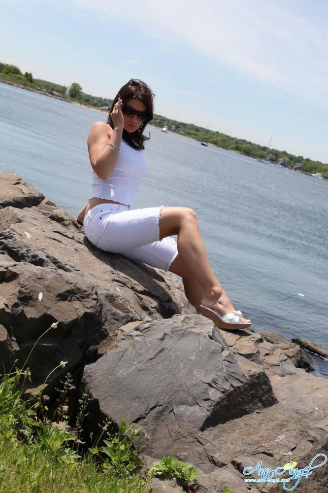 Sweet Brunette Chick Ann Angel Dressed In White Poses On The Bank Of The River - #11