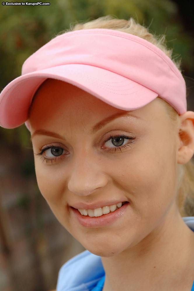 Very attractive young Samantha in shorts exposes her butt and bald pussy outdoor - #7