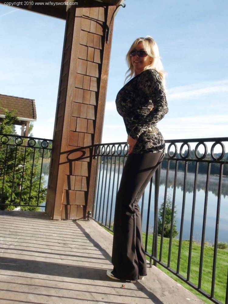 Hot american wife Sandra Otterson exposing big titties and hot ass outside - #1
