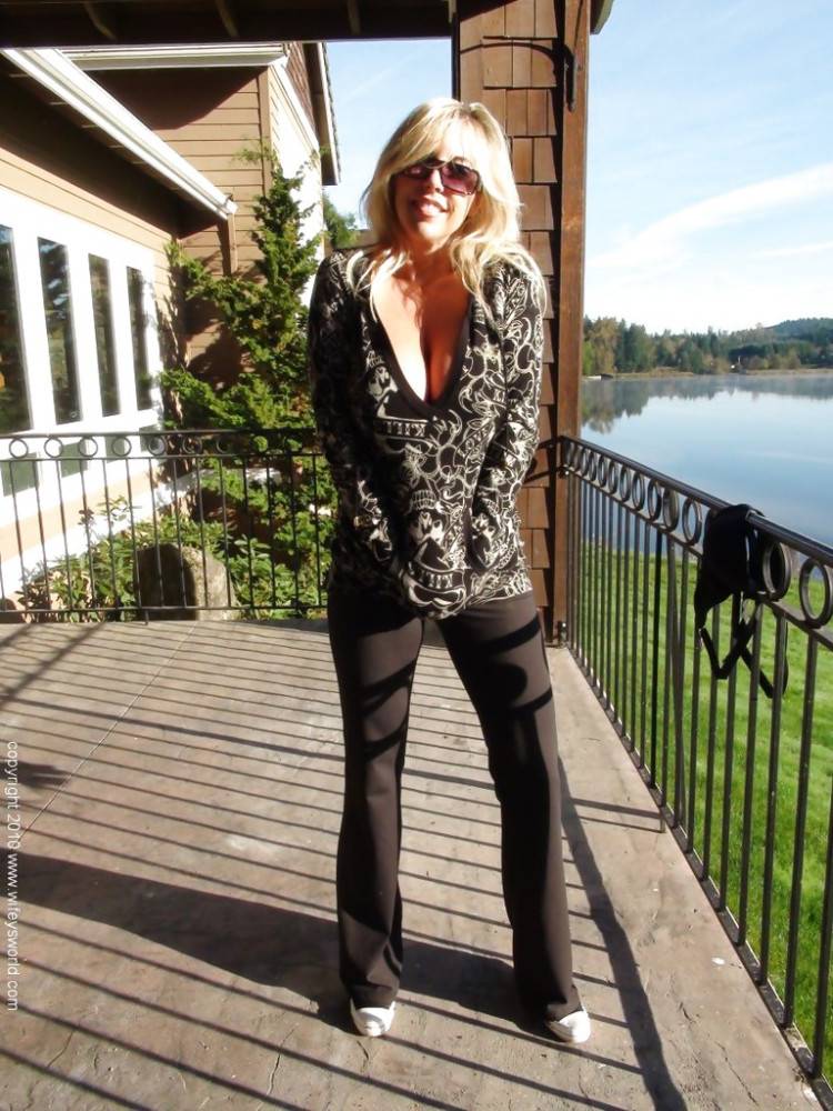 Hot american wife Sandra Otterson exposing big titties and hot ass outside - #14
