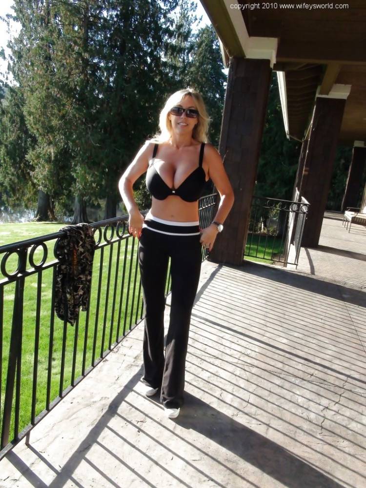 Hot american wife Sandra Otterson exposing big titties and hot ass outside - #4