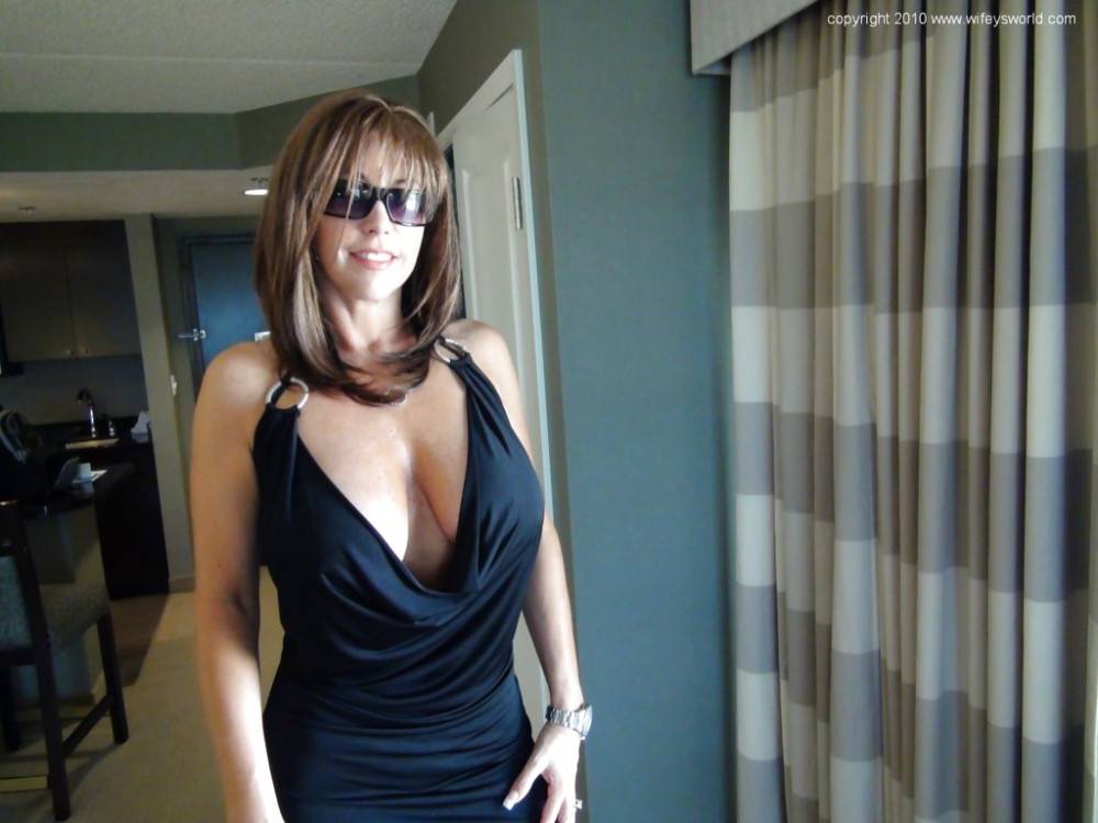Very attractive american older Sandra Otterson in sexy skirt exposes big tits and hot ass outside - #1