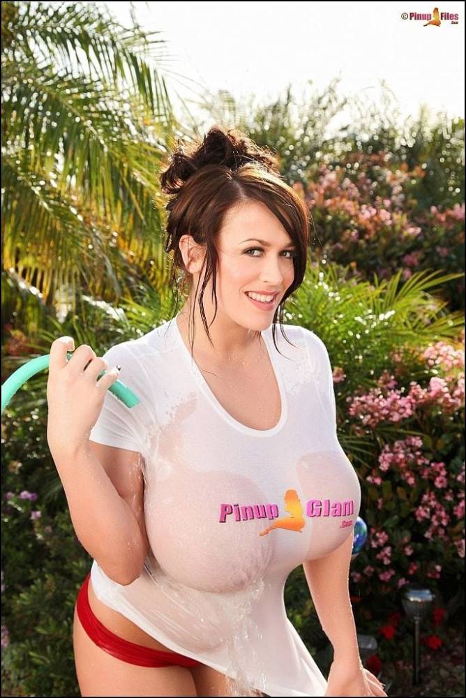 Tempting brittish brunette hottie Leanne Crow in sexy posing on camera outdoor - #17