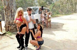 Lustful pornstars with big boobs have some fun with a big cock outdoor on picsofsex.com