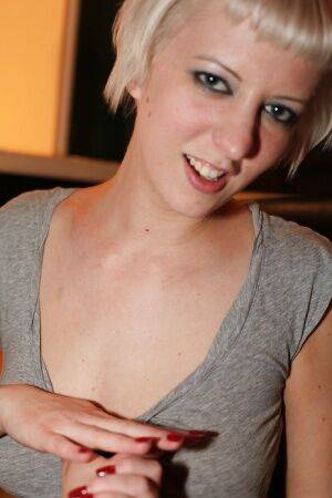 Short-haired blonde Cherry Torn revealing her big tits and shaved slit on picsofsex.com