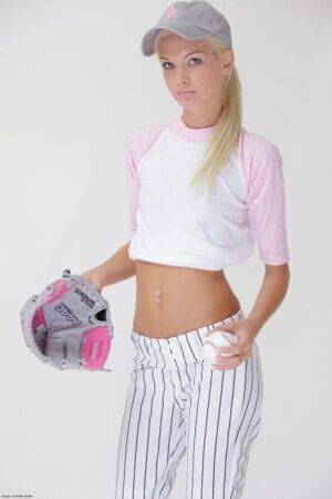 Baseball cutie Francesca loses her uniform to expose her skinny teen body on picsofsex.com