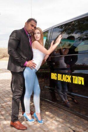 Teen slut Alexis Crystal sucks and fucks a black cock inside a limo on picsofsex.com