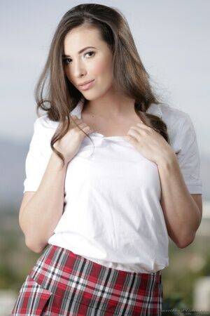 College girl Casey Calvert sheds a blazer and cotton underthings to pose nude on picsofsex.com