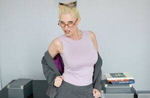 Mature teacher in glasses Devon Lee exposing her smashing goodies on picsofsex.com