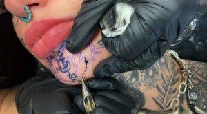 Tattoo enthusiast Amber Luke gets a new face tat from a female artist on picsofsex.com