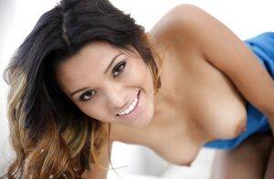 Petite Latina teenager Josie Jagger exposing puffy pink pussy on picsofsex.com