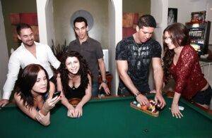 Promiscuous chicks enjoy a foursome groupsex at the house party on picsofsex.com