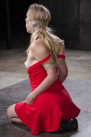 Blonde female Mona Wales has her first Shibari experience in a dungeon on picsofsex.com