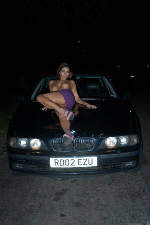 Long legged UK chick exposes her boobs on bonnet of car at night - Britain on picsofsex.com