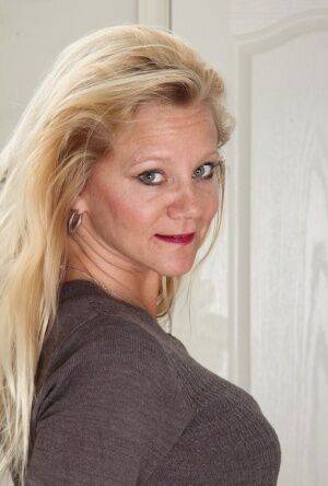 Mature Ali Jones is happy to show her big tits and sweet hairy pussy on picsofsex.com