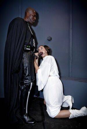 Interracial pornstar Allie Haze giving cosplay blowjob to huge black cock on picsofsex.com