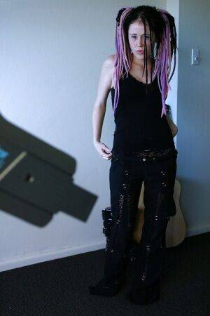 Young girl in dreadlocks recorded getting dressed by hidden spy camera on picsofsex.com