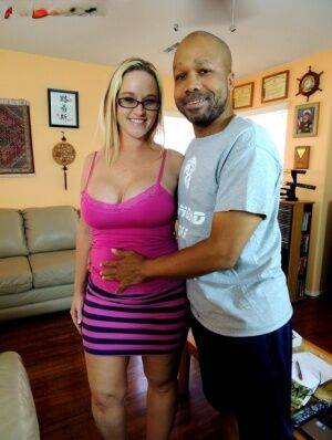 AWG Dee Siren meets black man Diamond Lou in a short dress on picsofsex.com