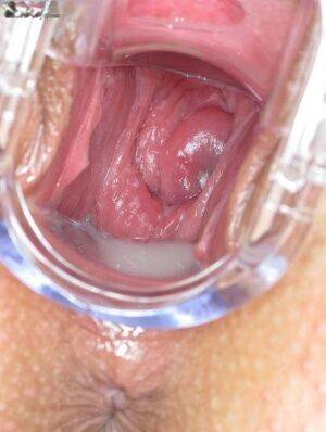 Hot blonde Laura Crystal inserts a speculum for a close up of her pink pussy on picsofsex.com