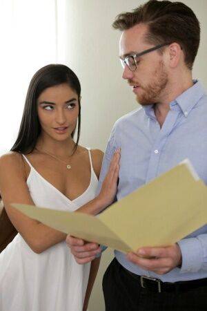 Sultry brunette Emily Willis seduces her realtor with a kiss in a white dress on picsofsex.com