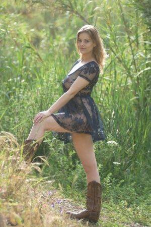 Beautiful amateur babe Lottii Rose wearing sexy dress and boots in the nature on picsofsex.com