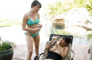 Hot lesbians Dana DeArmond & Dana Vespoli have some strapon fun outdoor on picsofsex.com